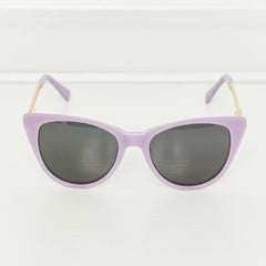 Lavender cat-eye acetate sunglasses with dark lenses and curved light gold temples