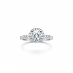 Sterling silver moissanite halo ring with round center stone and slim pavé band