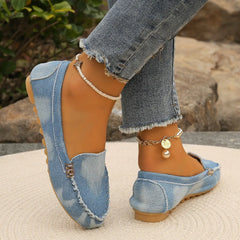 Light blue denim round-toe flat loafers with buckle strap and pearl chain ankle