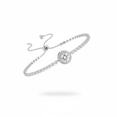 Silver round-stone tennis bracelet with side pavé stones and small ring clasp