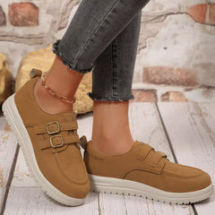 Cognac-tan buckle-accent casual loafers with double buckle straps and white gripped sole