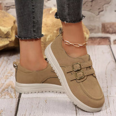 Tan suede buckle-accent casual loafers with double buckle straps and thick white sole