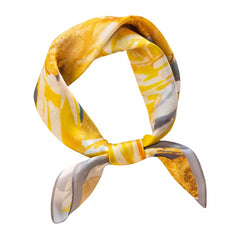 Silk square scarf with yellow floral-style print and folded knot, gray accents