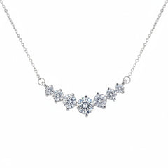 925 sterling silver moissanite necklace with spaced round stones along a V motif