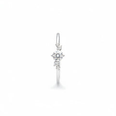 Side profile of sterling silver solitaire ring with round moissanite and pavé detailing