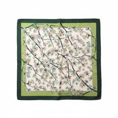 Silk scarf with scattered blossoms and butterflies on light base, green border
