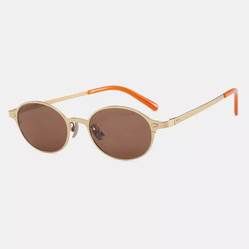 Vintage oval sunglasses, cream frame with orange arms and brown tinted lenses