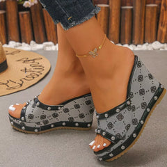 Peep toe wedge sandals with open toe, patterned straps, and chunky wedge sole
