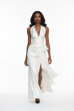 White satin maxi dress with V-neck wrap bodice and asymmetrical ruffled high-low hem