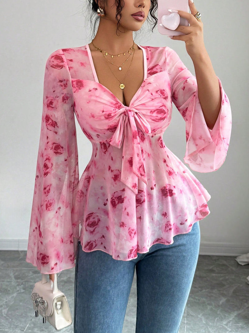 Floral chiffon blouse with tie-front and flared bell sleeves, pink with red rose print