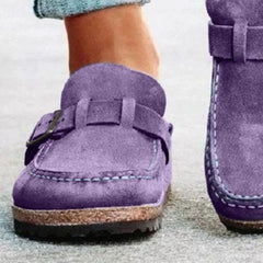 Purple round-toe low-heel loafers with front buckle strap and visible sole tread