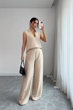 Beige sleeveless V-neck top and wide-leg pants set, matching two-piece outfit