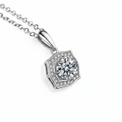 Silver necklace with square-shaped halo moissanite pendant, side view on link chain