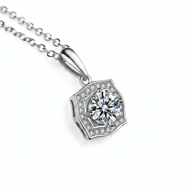 Silver necklace with square-shaped halo moissanite pendant, side view on link chain