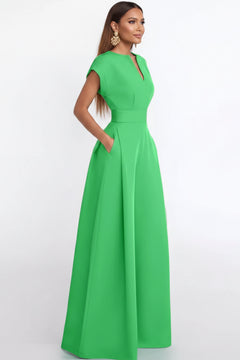 Neon green plus size jumpsuit with notched V-neck and wide-leg silhouette, short sleeves.