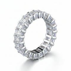 Rhodium-plated silver moissanite band ring with baguette-cut stones, open ring view.