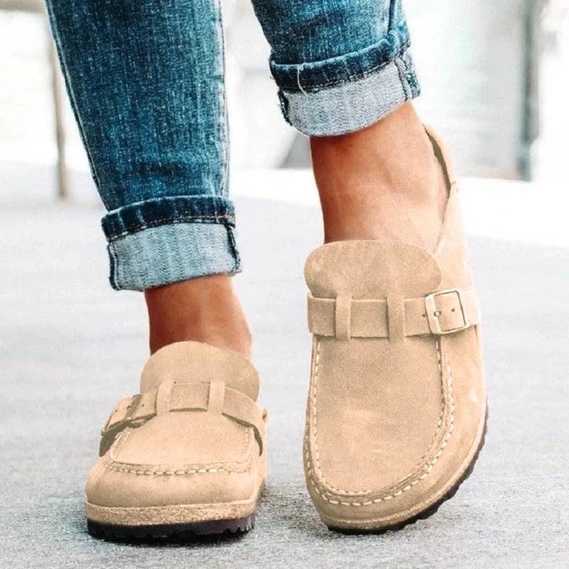 Tan suede round-toe low-heel loafers with front buckle strap and side stitching