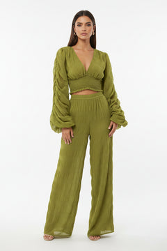 Olive green long-sleeve blouse with V-neck and smocked ruched waist, puff sleeves