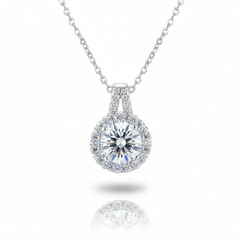 Sterling silver moissanite pendant necklace with round center stone and pavé halo