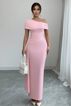 Light pink one-shoulder ruched maxi dress with folded neckline and smooth fitted skirt.