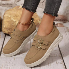 Light tan buckle-accent casual loafers with double buckle straps and white sole