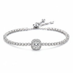 Silver pavé tennis bracelet with round center stone and small ball clasp hardware