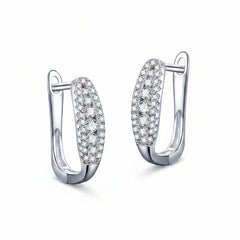 Silver hoop earrings with pavé moissanite stones in a curved setting