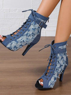 Peacock blue distressed denim lace-up peep-toe ankle boots, side view with ankle strap