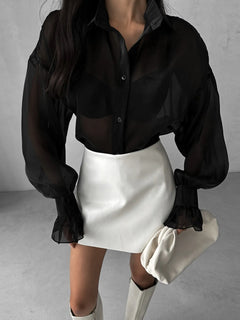 Black button-up flounce sleeve shirt with puff sleeves and sheer fabric