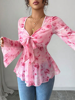 Floral chiffon peplum blouse with V-neck, tie-front, pink with red rose print and flare