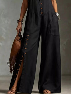Black sleeveless wide-leg jumpsuit with button placket and patch pockets
