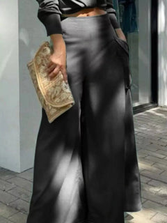 Black wide-leg pants with high waist and long-sleeve wrap top