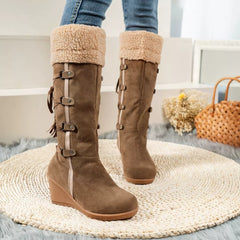 Brown suede-look wedge boots with faux-shearling cuff and strap buckles on sides