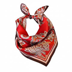 Deep red silk paisley scarf with decorative swirls, hemmed edges, and dark corner border