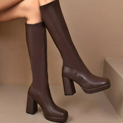 Brown square-toe block heel knee-high boots, angled side view