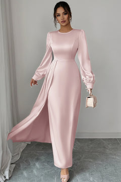 Blush pink satin long-sleeve maxi dress with fitted bodice and flowing skirt