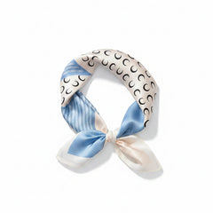 Light blue printed silk square scarf with crescent moons and diagonal striped border