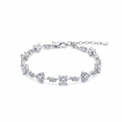 Sterling silver moissanite bracelet with chain clasp and angled prong-set stones