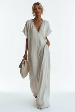 White lace-trim V-neck maxi dress with short sleeves and flowy relaxed fit