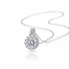 Sterling silver moissanite pendant necklace, draped chain with round halo pendant