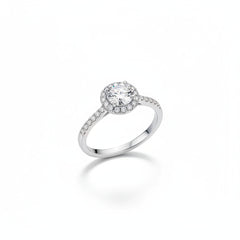 Front view of sterling silver moissanite halo solitaire ring with round center stone