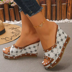 Peep toe wedge sandals with open toe and black-and-white patterned platform wedge