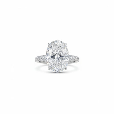 Sterling silver oval solitaire ring with prong-set center stone and slim shank