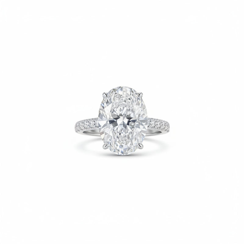 Sterling silver oval solitaire ring with prong-set center stone and slim shank