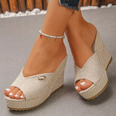 Peep-toe wedge sandals with light fabric uppers and braided platform heels