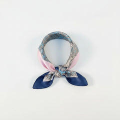Printed silk square scarf in blush pink with paisley border and navy tails
