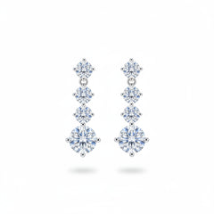 925 sterling silver drop stud earrings with three small and one larger round moissanite