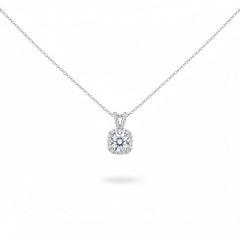 Round halo moissanite pendant with pavé bezel on a silver chain
