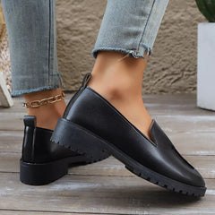 Black block heel loafers with rear stitching detail and V-cut front