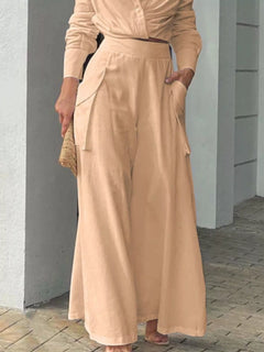 Tan long-sleeve shirt and wide-leg pants set with tied front waist